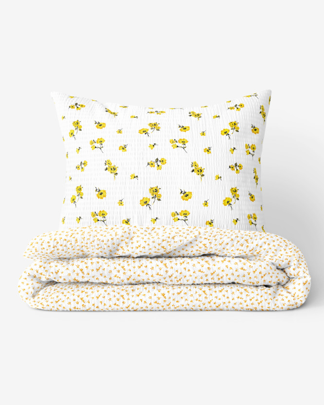 Krepové posteľné obliečky - žlté kvety a kvietky na bielom